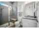 Bathroom with glass enclosed shower, white vanity and a toilet at 357 Tupelo Lake Dr, Summerville, SC 29486