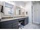 Bathroom features double vanity with gray countertop, marble floor and a stool at 357 Tupelo Lake Dr, Summerville, SC 29486