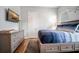 Bedroom features a dresser with TV and platform bed with storage drawers at 357 Tupelo Lake Dr, Summerville, SC 29486