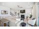 Bright living room featuring a fireplace, hardwood floors, and modern decor, ideal for relaxation and entertaining at 357 Tupelo Lake Dr, Summerville, SC 29486