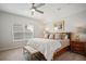 Comfortable bedroom featuring a large bed, bench, and windows providing natural light at 357 Tupelo Lake Dr, Summerville, SC 29486