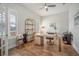 Bright office space featuring a ceiling fan, and ample natural light, alongside a stylish bookcase at 357 Tupelo Lake Dr, Summerville, SC 29486
