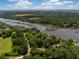 Stunning aerial view showcasing the serene river and lush landscapes at 3627 Holmes Dr, Johns Island, SC 29455