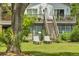 Backyard featuring a patio, stairs leading to the second floor and two lounge chairs on the lawn at 3627 Holmes Dr, Johns Island, SC 29455