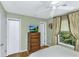 This bedroom provides a dresser, curtains, and neutral color tones at 3627 Holmes Dr, Johns Island, SC 29455