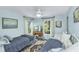 Comfortable bedroom featuring two twin beds, hardwood floors, and natural light at 3627 Holmes Dr, Johns Island, SC 29455