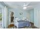 Charming bedroom featuring a twin bed, wood floors, and closet storage at 3627 Holmes Dr, Johns Island, SC 29455