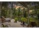 Enjoy relaxing on this beautiful deck with multiple seating arrangements, potted plants, and a wonderful view at 3627 Holmes Dr, Johns Island, SC 29455