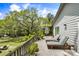 Spacious deck with lounge chairs, lush plants, and an inviting place to relax at 3627 Holmes Dr, Johns Island, SC 29455