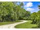 Scenic winding driveway leading to the property at 3627 Holmes Dr, Johns Island, SC 29455