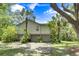 Exterior of home showcasing 3-car garage and lush landscaping at 3627 Holmes Dr, Johns Island, SC 29455