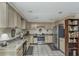 Bright kitchen with granite countertops, stainless steel appliances, and ample cabinetry at 3627 Holmes Dr, Johns Island, SC 29455