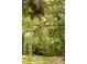 Lush greenery and majestic trees adorn this property with scenic, natural beauty at 3627 Holmes Dr, Johns Island, SC 29455