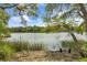 Picturesque waterfront view showcasing lush greenery and serene water at 3627 Holmes Dr, Johns Island, SC 29455