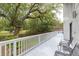 Relax on this back deck, boasting views of mature trees and private backyard at 37 Fort Royal Ave, Charleston, SC 29407