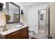 Stylish bathroom featuring wood vanity with marble countertop, and a separate toilet room at 37 Fort Royal Ave, Charleston, SC 29407