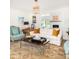 Cozy living area with fireplace, white sofa, and well-appointed furniture at 37 Fort Royal Ave, Charleston, SC 29407