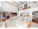 Open-concept living room with a modern kitchen, high ceilings, and loft at 37 Fort Royal Ave, Charleston, SC 29407
