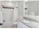 Clean bathroom featuring a subway tile shower with decorative tile accents and granite countertop at 4215 Ten Shillings Way, Ravenel, SC 29470