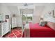 Bright bedroom featuring a four poster bed, large window and views of the water at 4215 Ten Shillings Way, Ravenel, SC 29470