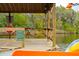 Private dock with a swing, water access, and clear views at 4215 Ten Shillings Way, Ravenel, SC 29470