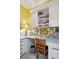 Bright office featuring custom cabinetry, built-in desk, and ample storage space at 4215 Ten Shillings Way, Ravenel, SC 29470