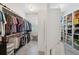 Spacious walk-in closet with built in shelving and storage for clothes and accessories at 4215 Ten Shillings Way, Ravenel, SC 29470