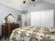 Traditional bedroom with a decorative mirror, and spacious closet, offering a cozy atmosphere at 482 Planters Trace Dr, Charleston, SC 29412