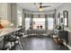 A dining room with gray walls, an accent table, and windows with natural light at 482 Planters Trace Dr, Charleston, SC 29412