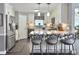 Charming kitchen featuring modern appliances and sleek barstool seating at 482 Planters Trace Dr, Charleston, SC 29412