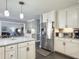 Bright kitchen showcasing granite countertops, stainless steel appliances, and a center island at 482 Planters Trace Dr, Charleston, SC 29412