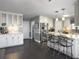 Modern kitchen with white cabinets, granite countertops, and stainless steel appliances at 482 Planters Trace Dr, Charleston, SC 29412