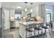 Well-lit kitchen featuring a center island with barstool seating at 482 Planters Trace Dr, Charleston, SC 29412
