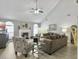 Spacious living room with a fireplace, plenty of seating, and natural light at 482 Planters Trace Dr, Charleston, SC 29412