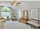 Bright living room with vaulted ceilings, plush carpeting, and a charming decor adds to its inviting atmosphere at 482 Planters Trace Dr, Charleston, SC 29412