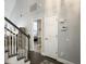Hallway view showcasing staircase leading to upper level; bedroom is partially visible at 482 Planters Trace Dr, Charleston, SC 29412