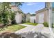 Private backyard with a concrete patio and well-maintained landscaping at 4823 Shady Tree Ln, Summerville, SC 29485