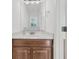 Well-lit bathroom with a clean vanity, large mirror, and neutral color scheme, offering a serene space at 4823 Shady Tree Ln, Summerville, SC 29485