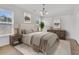 Cozy bedroom with neutral walls, wood floors, and lots of natural light at 4823 Shady Tree Ln, Summerville, SC 29485