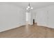 Bedroom with white walls, hardwood floors and multiple doors leading to other rooms at 4823 Shady Tree Ln, Summerville, SC 29485