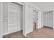 Bedroom closet with custom shelving and wood floors at 4823 Shady Tree Ln, Summerville, SC 29485
