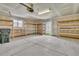 An oversized garage featuring an abundance of shelving for storage at 4823 Shady Tree Ln, Summerville, SC 29485