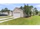 Detached garage with multiple bays, providing ample parking and storage at 4823 Shady Tree Ln, Summerville, SC 29485