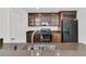 Kitchen view features granite countertops, stainless steel appliances, and custom cabinets at 4823 Shady Tree Ln, Summerville, SC 29485