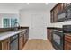Kitchen with breakfast bar, stainless appliances and ample cabinet space at 4823 Shady Tree Ln, Summerville, SC 29485