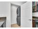 Convenient laundry closet with stackable washer and dryer units at 4823 Shady Tree Ln, Summerville, SC 29485