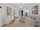 Stylish living room featuring hardwood floors, wainscoting detail, comfortable seating, and elegant decor for relaxed living at 4823 Shady Tree Ln, Summerville, SC 29485
