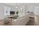 Comfortable living room with a plush sofa, modern decor, and natural light at 4823 Shady Tree Ln, Summerville, SC 29485