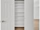 View of pantry with white shelving from open door, showing ample storage at 4823 Shady Tree Ln, Summerville, SC 29485