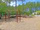 Enjoy the community playground with swings and other play equipment in a safe environment at 4823 Shady Tree Ln, Summerville, SC 29485